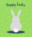 Vector illustration of Happy Easter with a gray bunny sitting with his back and an inscription on top on a green background with e